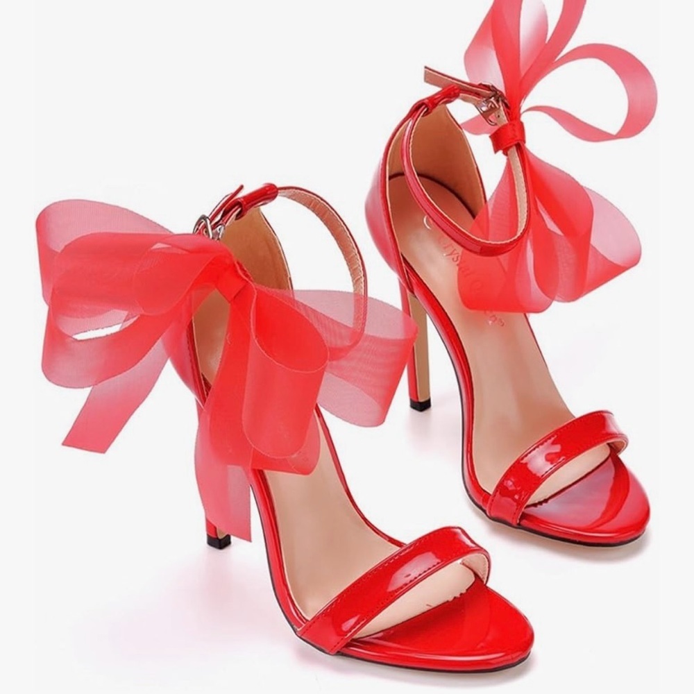 Women’s red high heel sandals ankle straps.